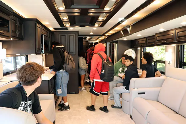 Shippensburg students tour a Class A motorhome